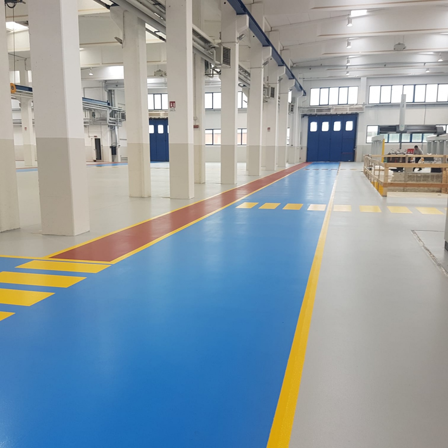 Corsie e pavimentazione in resina negli spazi industriali Sandvik